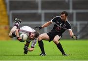 15 October 2017; Francis McEldowney of Slaughtneil in action against Aidan Branagan of Kilcoo, during the AIB Ulster GAA Football Senior Club Championship First Round match between Kilcoo and Slaughtneil at Páirc Esler in Down. Photo by Seb Daly/Sportsfile