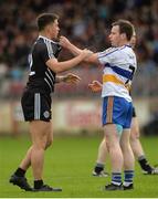 15 October 2017; Ronan O'Neill of Omagh St Enda's has words with Cathal McRory of Errigal Ciaran during the Tyrone County Senior Football Championship Final match between Errigal Ciaran and Omagh St Enda's at Healy Park in Tyrone. Photo by Oliver McVeigh/Sportsfile