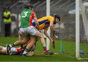 15 October 2017; Shane Golden of Sixmilebridge is tackled, in front of the goal line by the Clooney Quin goalkeeper Keith Hogan and full back Shane McNamara, resulting in a penalty being awarded, during the Clare County Senior Hurling Championship Final match between Clooney Quin and Sixmilebridge at Cusack Park in Ennis County Clare. Photo by Ray McManus/Sportsfile