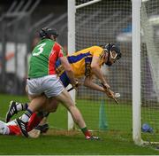 15 October 2017; Shane Golden of Sixmilebridge is tackled, in front of the goal line by the Clooney Quin goalkeeper Keith Hogan and full back Shane McNamara, resulting in a penalty being awarded, during the Clare County Senior Hurling Championship Final match between Clooney Quin and Sixmilebridge at Cusack Park in Ennis County Clare. Photo by Ray McManus/Sportsfile