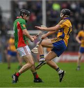 15 October 2017; Ruaidhrí McNamara of Clooney Quin in action against Shane Golden of Sixmilebridge, during the Clare County Senior Hurling Championship Final match between Clooney Quin and Sixmilebridge at Cusack Park in Ennis County Clare. Photo by Ray McManus/Sportsfile