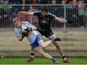 15 October 2017; Peter Og McCartan of Errigal Ciaran in action against Joe McMahon of Omagh St Enda's during the Tyrone County Senior Football Championship Final match between Errigal Ciaran and Omagh St Enda's at Healy Park in Tyrone. Photo by Oliver McVeigh/Sportsfile