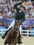 8 August 2012; Ireland's Cian O'Connor, on Blue Lloyd 12, celebrates after the final round in the individual show jumping final which he only recorded 1 time fault and won a bronze medal after a jump off. London 2012 Olympic Games, Equestrian, Greenwich Park, Greenwich, London, England. Picture credit: Brendan Moran / SPORTSFILE