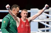 8 August 2012; Paddy Barnes, Ireland, celebrates, alongside Team Ireland boxing head coach Billy Walsh, after being declared winner over Devendro Laishram, India, in their men's light flyweight 49kg quarter-final. London 2012 Olympic Games, Boxing, South Arena 2, ExCeL Arena, Royal Victoria Dock, London, England. Picture credit: David Maher / SPORTSFILE