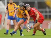 4 August 2012; Anna Geary, Cork, in action against Katie Cahill, Clare. All-Ireland Senior Camogie Championship Quarter-Final, Cork v Clare, Páirc Ui Chaoimh, Cork. Picture credit: Pat Murphy / SPORTSFILE