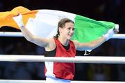 9 August 2012; Katie Taylor, Ireland, celebrates after being declared the winner over Sofya Ochigava, Russia, in their women's light 60kg final contest. London 2012 Olympic Games, Boxing, South Arena 2, ExCeL Arena, Royal Victoria Dock, London, England. Picture credit: David Maher / SPORTSFILE