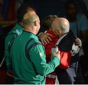 9 August 2012; Katie Taylor, Ireland, is congratulated by former world featherweight champion Barry McGuigan after being declared the winner over Sofya Ochigava, Russia, in their women's light 60kg final contest. London 2012 Olympic Games, Boxing, South Arena 2, ExCeL Arena, Royal Victoria Dock, London, England. Picture credit: Brendan Moran / SPORTSFILE