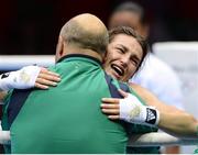 9 August 2012; Katie Taylor, Ireland, is congratulated by her father and coach Pete Taylor after she was declared the winner over Sofya Ochigava, Russia, in their women's light 60kg final contest. London 2012 Olympic Games, Boxing, South Arena 2, ExCeL Arena, Royal Victoria Dock, London, England. Picture credit: David Maher / SPORTSFILE
