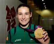 9 August 2012; Katie Taylor, Ireland, celebrates with her gold medal after victory over Sofya Ochigava, Russia, after their women's light 60kg final contest. London 2012 Olympic Games, Boxing, South Arena 2, ExCeL Arena, Royal Victoria Dock, London, England. Picture credit: David Maher / SPORTSFILE