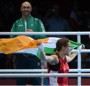 9 August 2012; Katie Taylor, Ireland, celebrates after being declared the winner over Sofya Ochigava, Russia, in their women's light 60kg final contest. London 2012 Olympic Games, Boxing, South Arena 2, ExCeL Arena, Royal Victoria Dock, London, England. Picture credit: Ray McManus / SPORTSFILE