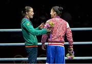 9 August 2012; Katie Taylor, Ireland, with Sofya Ochigava, Russia, after the medal presentation for their women's light 60kg final. London 2012 Olympic Games, Boxing, South Arena 2, ExCeL Arena, Royal Victoria Dock, London, England. Picture credit: David Maher / SPORTSFILE