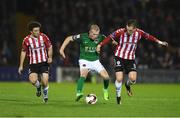 17 October 2017; Stephen Dooley of Cork City in action against Barry McNamee, left, and Ronan Curtis of Derry City during the SSE Airtricity League Premier Division match between Cork City and Derry City at Turners Cross, in Cork.  Photo by Eóin Noonan/Sportsfile