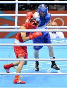 10 August 2012; Paddy Barnes, Ireland, right, exchanges punches with Shiming Zou, China, during their men's light fly 49kg semi-final contest. London 2012 Olympic Games, Boxing, South Arena 2, ExCeL Arena, Royal Victoria Dock, London, England. Picture credit: Stephen McCarthy / SPORTSFILE
