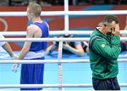 10 August 2012; A dejected Ireland head coach Billy Walsh after Shiming Zou, China, is declared the winner in his men's light fly 49kg semi-final contest over Paddy Barnes, Ireland. London 2012 Olympic Games, Boxing, South Arena 2, ExCeL Arena, Royal Victoria Dock, London, England. Picture credit: Stephen McCarthy / SPORTSFILE