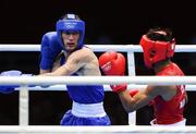 10 August 2012; John Joe Nevin, Ireland, left, exchanges punches with Lazaro Alvarez Estrada, Cuba, during their men's bantam 56kg semi-final contest. London 2012 Olympic Games, Boxing, South Arena 2, ExCeL Arena, Royal Victoria Dock, London, England. Picture credit: David Maher / SPORTSFILE