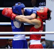 10 August 2012; Paddy Barnes, Ireland, left, exchanges punches with Shiming Zou, China, during their men's light fly 49kg semi-final contest. London 2012 Olympic Games, Boxing, South Arena 2, ExCeL Arena, Royal Victoria Dock, London, England. Picture credit: David Maher / SPORTSFILE