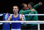 10 August 2012; John Joe Nevin, Ireland, celebrates, as Team Ireland boxing head coach Billy Walsh, right, and Team Ireland boxing technical & tactical head coach Zaur Anita embrace after he was declared the winner over Lazaro Alvarez Estrada, Cuba, intheir men's bantam 56kg semi-final contest. London 2012 Olympic Games, Boxing, South Arena 2, ExCeL Arena, Royal Victoria Dock, London, England. Picture credit: David Maher / SPORTSFILE