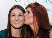 10 August 2012; Team Ireland's Katie Taylor, who won a gold medal for boxing in the women's light 60kg division, gets a kiss from her mother Bridget, at a celebration for Katie Taylor on behalf of P&G London. London 2012 Olympic Games, Boxing, The BigChill House, KingsCross, London, England. Picture credit: David Maher / SPORTSFILE