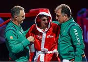 10 August 2012; Michael Conlan, Ireland, accompanied by Team Ireland boxing head coach Billy Walsh, left, and Team Ireland boxing technical & tactical head coach Zaur Anita, reacts after his fly 52kg semi-final contest. London 2012 Olympic Games, Boxing, South Arena 2, ExCeL Arena, Royal Victoria Dock, London, England. Picture credit: Stephen McCarthy / SPORTSFILE
