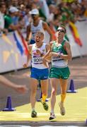 11 August 2012; Ireland's Robert Heffernan crosses the finish line in 4th position ahead of Igor Erokhin, Russia, during the men's 50km race walk. London 2012 Olympic Games, Athletics, The Mall, Westminster, London, England. Picture credit: Stephen McCarthy / SPORTSFILE