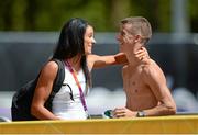 11 August 2012; Ireland's Robert Heffernan with his wife Marian after finishing in 4th position during the men's 50km race walk. London 2012 Olympic Games, Athletics, The Mall, Westminster, London, England. Picture credit: Stephen McCarthy / SPORTSFILE