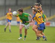 11 August 2012; Vivienne McCormack, Meath, in action against Michelle Delaney, centre, and Lorraine Kelly, Clare. TG4 All-Ireland Ladies Football Senior Championship Qualifier Round 2, Clare v Meath, St. Brendan’s Park, Birr, Co. Offaly. Picture credit: Barry Cregg / SPORTSFILE