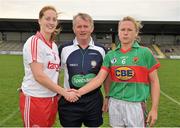 11 August 2012; Tyrone captain Shannon Quinn, left, shakes hands with Mayo captain Claire Egan alongside referee Pat Kehoe before the game. TG4 All-Ireland Ladies Football Senior Championship Qualifier Round 2, Mayo v Tyrone, St. Brendan’s Park, Birr, Co. Offaly. Picture credit: Barry Cregg / SPORTSFILE