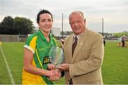 11 August 2012; Katie O'Brien, Meath, is presented with the player of the match award by Pat Quill, President, Ladies Gaelic Football Association. TG4 All-Ireland Ladies Football Senior Championship Qualifier Round 2, Clare v Meath, St. Brendan’s Park, Birr, Co. Offaly. Picture credit: Barry Cregg / SPORTSFILE