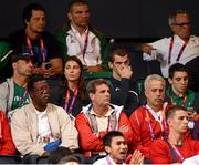 11 August 2012; Team Ireland boxing members, centre row from left, coach Pete Taylor, Katie Taylor, Adam Nolan and Michael Conlan, at the ExCeL Arena ahead of John Joe Nevin's bantam 56kg final contest against Luke Campbell, Great Britain. London 2012 Olympic Games, Boxing, South Arena 2, ExCeL Arena, Royal Victoria Dock, London, England. Picture credit: David Maher / SPORTSFILE
