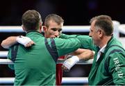 11 August 2012; John Joe Nevin, Ireland, is consoled by Team Ireland boxing head coach Billy Walsh, left, and Team Ireland boxing technical & tactical head coach Zaur Anita after his men's bantam 56kg final contest. London 2012 Olympic Games, Boxing, South Arena 2, ExCeL Arena, Royal Victoria Dock, London, England. Picture credit: David Maher / SPORTSFILE