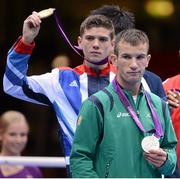 11 August 2012; Team Ireland's John Joe Nevin and Great Britain's Luke Campbell celebrate with their men's bantam 56kg Olympic medals. London 2012 Olympic Games, Boxing, South Arena 2, ExCeL Arena, Royal Victoria Dock, London, England. Picture credit: Brendan Moran / SPORTSFILE