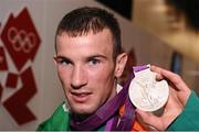 11 August 2012; Team Ireland's John Joe Nevin, men's bantam 56kg, celebrates with his Olympic silver medal. London 2012 Olympic Games, Boxing, South Arena 2, ExCeL Arena, Royal Victoria Dock, London, England. Picture credit: David Maher / SPORTSFILE