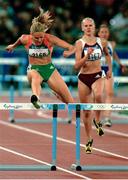 24 September 2000; Ireland's Susan Smith Walsh clears the last during the Women's 400m Hurdles heat from which she failed to qualify for the next round. Stadium Australia, Sydney Olympic Park. Homebush Bay, Sydney, Australia. Athletics. Sydney Olympics 2000. Photo by Brendan Moran/Sportsfile