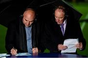 20 October 2017; Former St Patrick's Athletic managers Johnny McDonnell and Brian Kerr, right, examine the team sheets prior to the SSE Airtricity League Premier Division match between St Patrick's Athletic and Cork City at Richmond Park in Dublin. Photo by Stephen McCarthy/Sportsfile