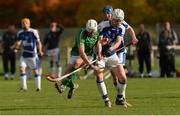 21 October 2017; Kevin McDonald of Ireland in action against John Gillies of Scotland during the U21 Shinty International match between Ireland and Scotland at Bught Park in Inverness, Scotland. Photo by Piaras Ó Mídheach/Sportsfile