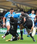 21 October 2017; Fergus McFadden of Leinster is tackled by Ali Price, left, and Finn Russell of Glasgow Warriors during the European Rugby Champions Cup Pool 3 Round 2 match between Glasgow Warriors and Leinster at Scotstoun in Glasgow, Scotland. Photo by Ramsey Cardy/Sportsfile