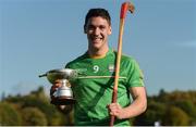 21 October 2017; Ireland captain Séan Finn with the cup and a Scottish shinty stick, after the U21 Shinty International match between Ireland and Scotland at Bught Park in Inverness, Scotland. Photo by Piaras Ó Mídheach/Sportsfile