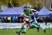 21 October 2017; John McGrath of Ireland in action against Rory Kennedy of Scotland during the Shinty International match between Ireland and Scotland at Bught Park in Inverness, Scotland. Photo by Piaras Ó Mídheach/Sportsfile