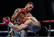 21 October 2017; David Oliver Joyce, left, exchanges punches with Andy Harris during their Lightweight bout at the SSE Arena in Belfast. Photo by David Fitzgerald/Sportsfile
