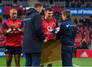 21 October 2017; Former Munster players and current Racing 92 player and coach Donnacha Ryan and Ronan O'Gara make a presentation to Munster captain Peter O'Mahony, to mark the first anniversary of the death of Munster coach Anthony Foley, before the European Rugby Champions Cup Pool 4 Round 2 match between Munster and Racing 92 at Thomond Park in Limerick. Photo by Brendan Moran/Sportsfile