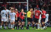 21 October 2017; Referee JP Doyle attempts to seperate players from both sides during the European Rugby Champions Cup Pool 4 Round 2 match between Munster and Racing 92 at Thomond Park in Limerick. Photo by Brendan Moran/Sportsfile