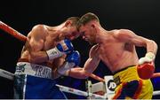 21 October 2017; James Tennyson, right, exchanges punches with Darren Traynor during their WBA International Super-Featherweight Title bout at the SSE Arena in Belfast. Photo by David Fitzgerald/Sportsfile