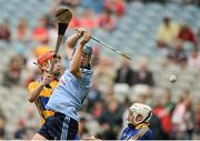 12 August 2012; Oisin O'Rorke, Dublin, flicks the sliothar past Clare goalkeeper Eibhear Quillian and Gearoid Ryan, left, Clare, before following up to score his side's first goal. Electric Ireland GAA Hurling All-Ireland Minor Championship Semi-Final, Clare v Dublin, Croke Park, Dublin. Picture credit: Brian Lawless / SPORTSFILE