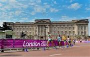 12 August 2012; Ireland's Mark Kenneally passes Buckingham Palace during the men's marathon where he finished in 57th place. London 2012 Olympic Games, Athletics, The Mall, Westminster, London, England. Picture credit: Brendan Moran / SPORTSFILE