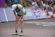 12 August 2012; Ireland's Mark Kenneally after crossing the finish line in the men's marathon where he finished in 57th place. London 2012 Olympic Games, Athletics, The Mall, Westminster, London, England. Picture credit: Brendan Moran / SPORTSFILE