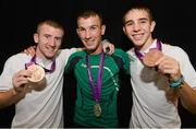 12 August 2012; Team Ireland's, from left to right, Paddy Barnes, who won bronze in the men's light fly 49kg, John Joe Nevin, who won silver in the men's bantam 56kg, and Michael Conlon, who won bronze in the men's fly 52kg, pictured with their medals at the ExCeL Arena. London 2012 Olympic Games, Boxing, South Arena 2, ExCeL Arena, Royal Victoria Dock, London, England. Picture credit: David Maher / SPORTSFILE