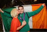 12 August 2012; Team Ireland's Michael Conlan, who won bronze in the men's fly 52kg, is congratulated by his mother Thersea after he was presented with his Olympic bronze medal. London 2012 Olympic Games, Boxing, South Arena 2, ExCeL Arena, Royal Victoria Dock, London, England. Picture credit: David Maher / SPORTSFILE