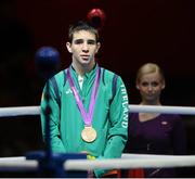 12 August 2012; Team Ireland's Michael Conlan, who won bronze in the men's fly 52kg, after he was presented with his Olympic bronze medal. London 2012 Olympic Games, Boxing, South Arena 2, ExCeL Arena, Royal Victoria Dock, London, England. Picture credit: David Maher / SPORTSFILE