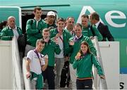 13 August 2012; Team Ireland medalists including Olympic champion Katie Taylor, gold, boxing, front right, with clockwise from left, John Joe Nevin, silver, boxing, Paddy Barnes, bronze, boxing, Michael Conlan, bronze, boxing, and Cian O'Connor, bronze, show jumping, on their arrival home from the London 2012 Olympic Games. Dublin Airport, Dublin. Picture credit: Ray McManus / SPORTSFILE