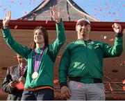 13 August 2012; Olympic champion Katie Taylor and her father and Team Ireland boxing coach Pete Taylor celebrate with her gold medal for boxing on their arrival home from the London 2012 Olympic Games. Bray, Co. Wicklow. Picture credit: Pat Murphy / SPORTSFILE